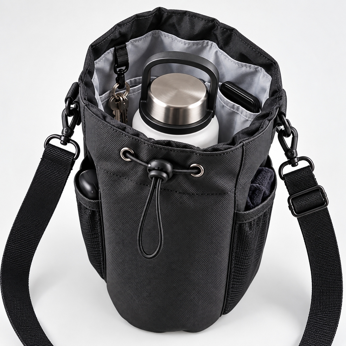 Open black water bottle holder bag showing bottle compartment, inner pockets and key clip